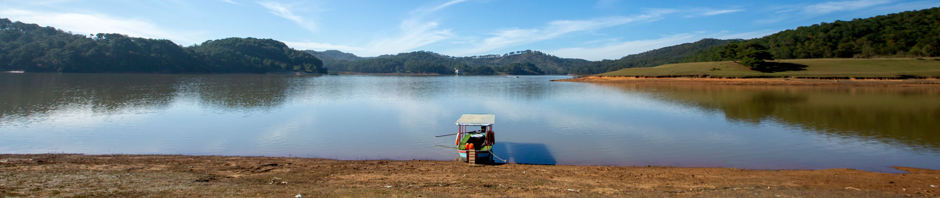 Beautiful lake view with a boat in Vietnam